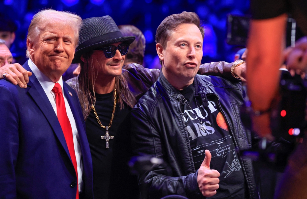 US President-elect Donald Trump, singer Kid Rock and Tesla and SpaceX CEO Elon Musk pose for a photo as they attend UFC 309 at Madison Square Garden in New York, on November 16, 2024. –– AFP pic 
