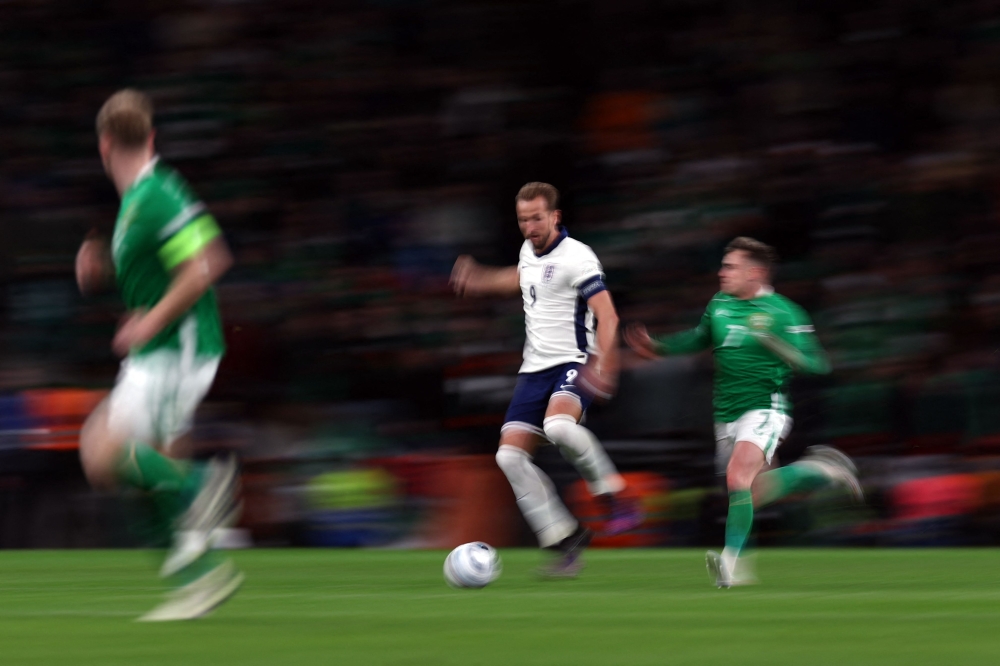 England's striker #09 Harry Kane vies for the ball with Ireland's forward #07 Sammie Szmodics during the UefaNations League, League B - Group 2, football match between England and the Republic of Ireland at Wembley Stadium in London on November 17, 2024. — AFP pic