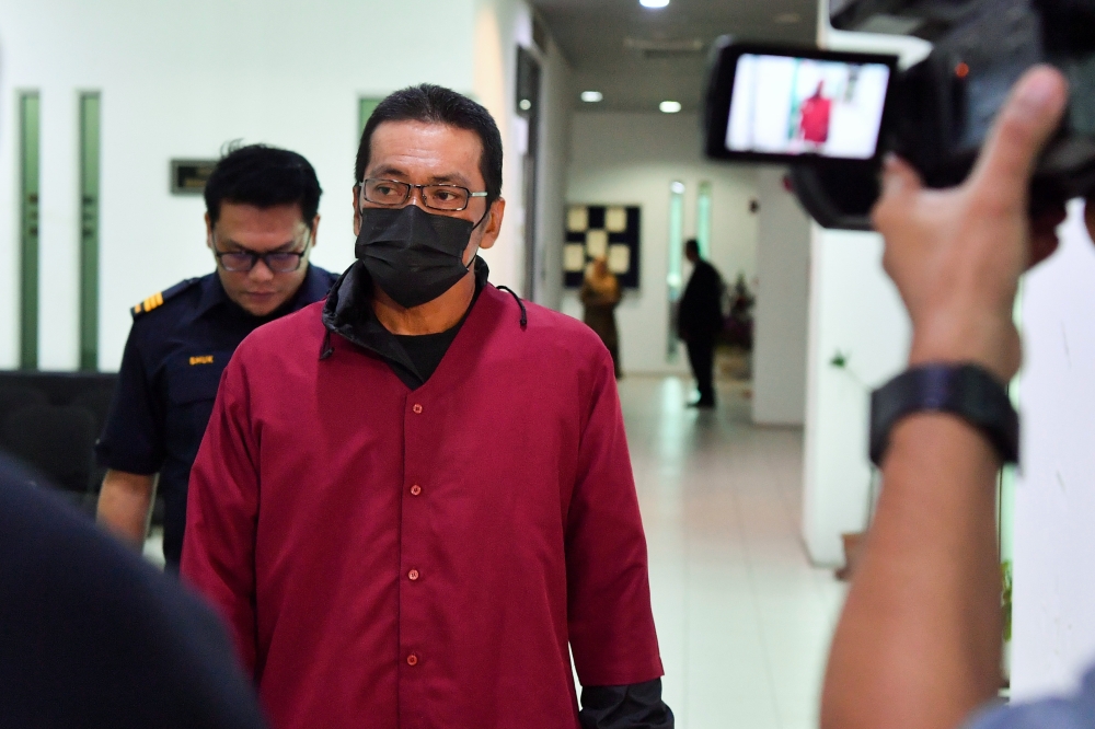 Idris Ami, 60, was accused of promoting actions contrary to Islamic law to a group of individuals known as 'Kumpulan Cahaya’, allowing the opposite sex to embrace, claiming it was based on love from the heart rather than physical desire. –– Bernama pic 