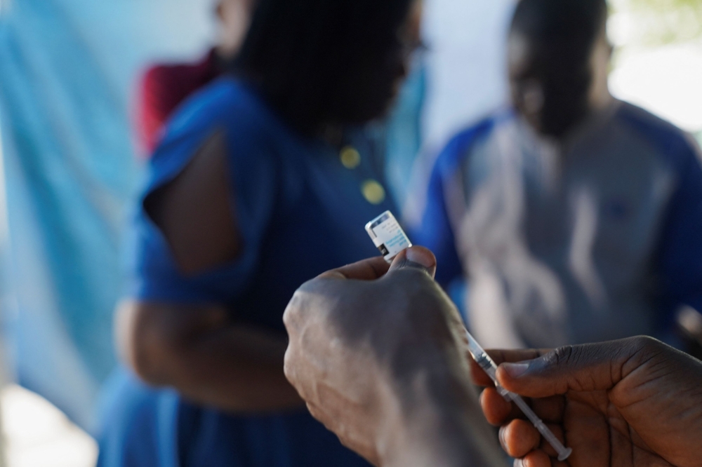A Nigerian health official prepares to administer a mpox vaccination, at Federal Medical Centre in Abuja, Nigeria November 18, 2024. — Reuters pic