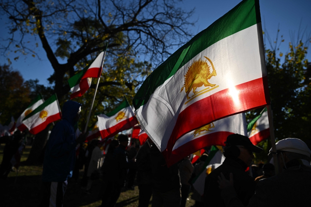 Months-long nationwide protests shook Iran following the September 2022 death in custody of 22-year-old Iranian Kurd Mahsa Amini over an alleged violation the dress code for women. — AFP pic