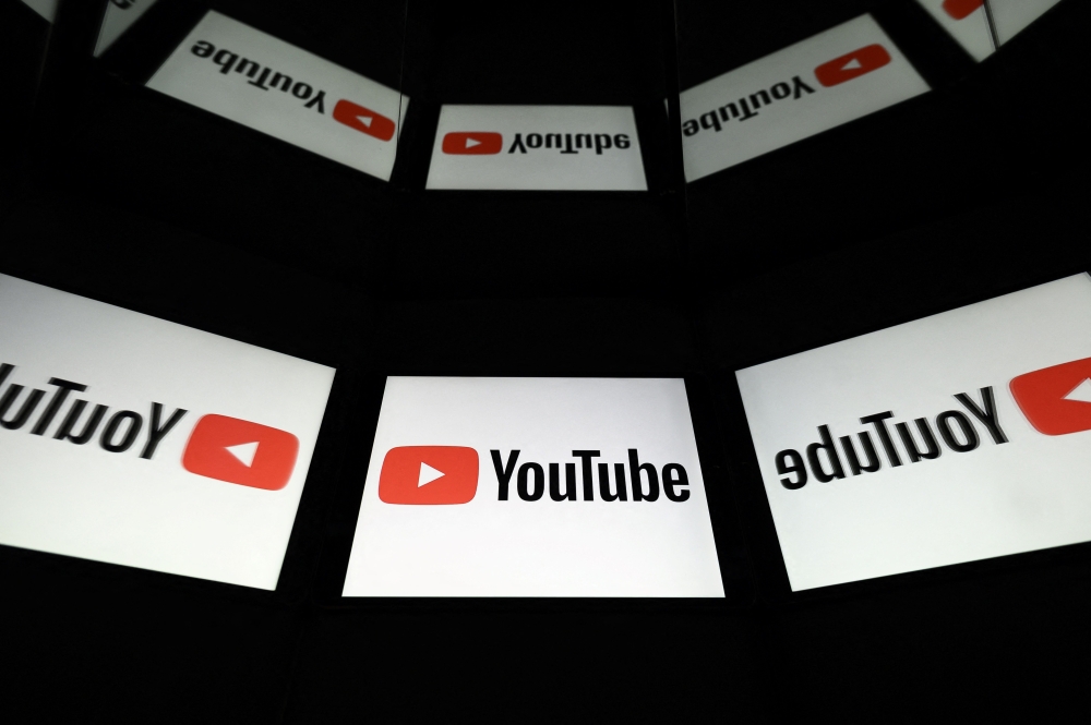 Some companies will be granted exemptions from the ban, such as YouTube, which teenagers may need to use for school work or other reasons. —AFP pic