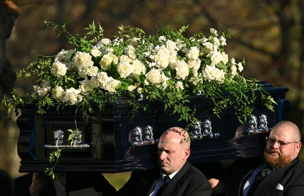 Pallbearers carry the coffin of late One Direction singer Liam Payne out of St Mary’s church following his funeral service in Amersham, west of London on November 20, 2024. –– AFP pic