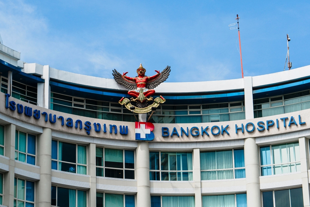This photo shows the logo of the Bangkok Hospital in Bangkok on November 21, 2024. A young Australian woman has died and another is fighting for her life in hospital in Bangkok. — AFP