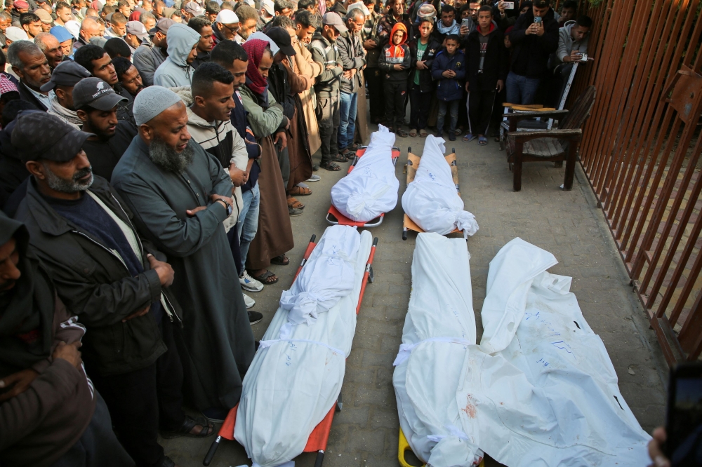 Mourners attend the funeral of Palestinians killed in Israeli strike, in Khan Younis in the southern Gaza Strip, November 21, 2024. — Reuters pic