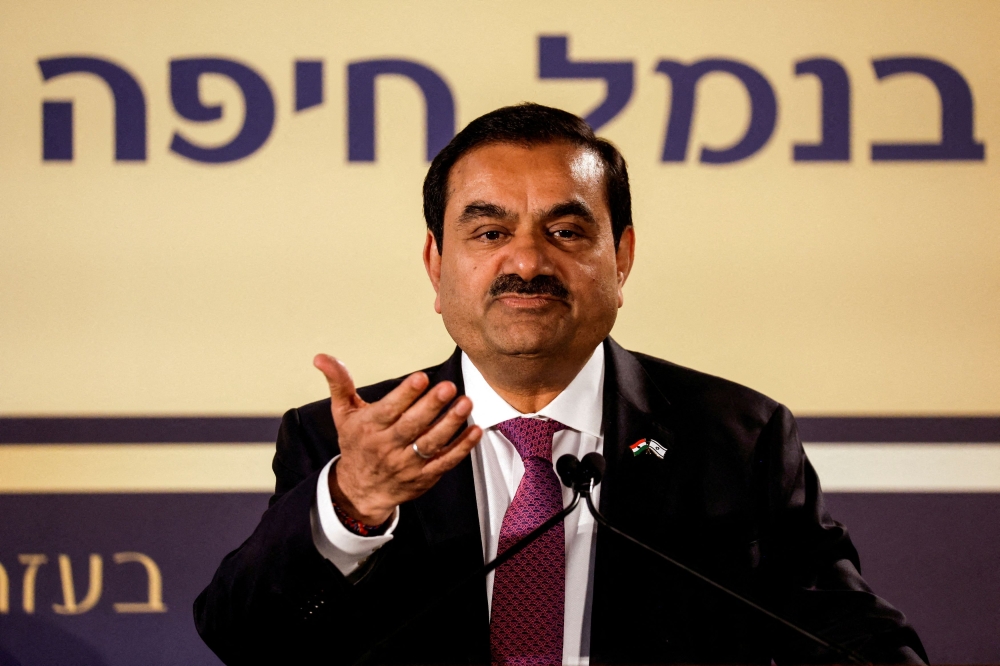 Indian billionaire Gautam Adani speaks during an inauguration ceremony after the Adani Group completed the purchase of Haifa Port earlier in January 2023, in Haifa port, Israel January 31, 2023. — Reuters pic