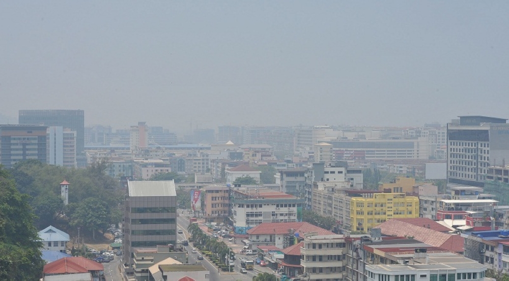 An aerial view of Kota Kinabalu shows the city shrouded in a thick haze on April 4, 2016. — Bernama pic