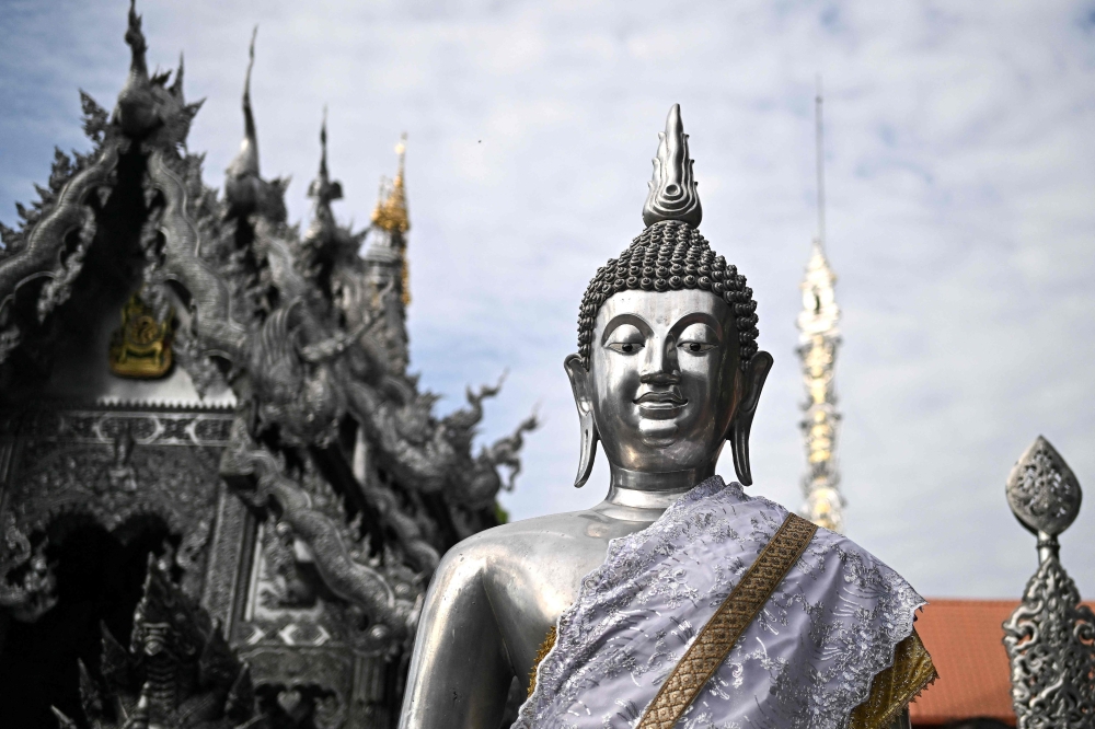 A Buddha statue is seen at the Wat Sri Suphan in Chiang Mai, north Thailand on November 17, 2024. The Pa Nakhon Chaibovorn monastery in Phichit province is under investigation over its unusual meditation practice incorporating cadavers. — AFP pic