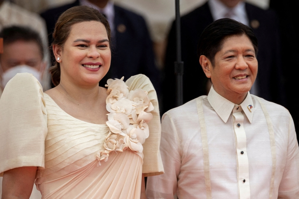 Philippine President Ferdinand ‘Bongbong’ Marcos Jr (right) stands next to his Vice-President Sara Duterte during their inauguration ceremony at the National Museum in Manila on June 30, 2022. — Reuters file pic