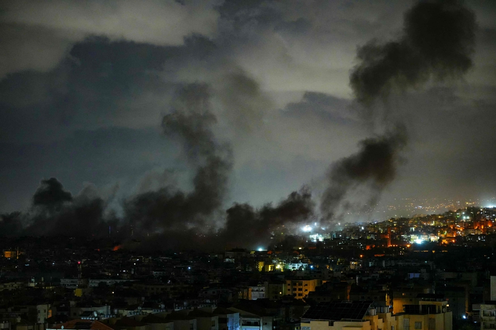 Smoke rises from the site of Israeli airstrikes that targeted Beirut’s southern suburbs on November 24, 2024, amid the ongoing war between Israel and Hezbollah. –– AFP pic