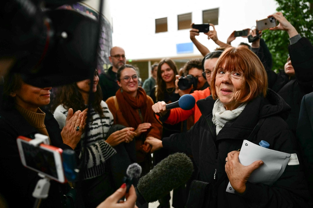 Gisele Pelicot (right) addresses media at the Avignon courthouse during the trial of her former partner Dominique Pelicot accused of drugging her for nearly ten years and inviting strangers to rape her at their home in Mazan, a small town in the south of France, in Avignon, on November 20, 2024. –– AFP pic 