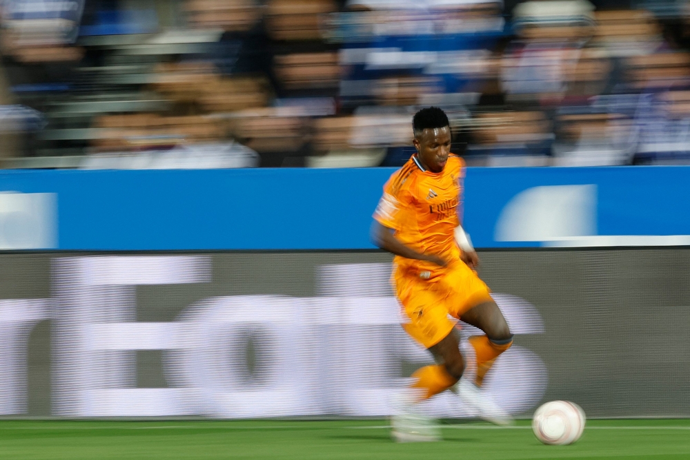 Real Madrid's Brazilian forward Vinicius Junior dribbles the ball during the Spanish league football match between Club Deportivo Leganes SAD and Real Madrid CF at the Estadio Municipal Butarque in Leganes on November 24, 2024. — AFP pic