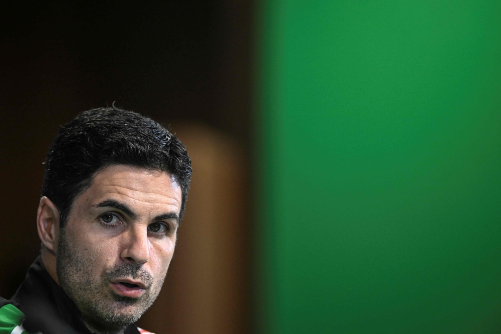 Arsenal’s coach Mikel Arteta gives a press conference on the eve of their Uefa Champions League football match against Sporting CP at Alvalade stadium in Lisbon November 25, 2024. — AFP pic