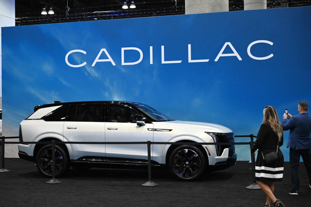 Attendees view the Cadillac Escalade IQ 1000E4 full-size electric luxury SUV during the AutoMobility LA 2024 auto show at the Los Angeles Convention Centre November 21, 2024. — AFP pic