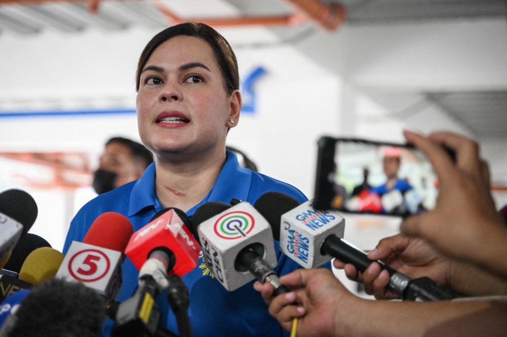 Philippine Vice President Sara Duterte holds a press conference at a hospital in Quezon City, Metro Manila on November 26, 2024. Duterte today denied she was plotting to kill President Ferdinand Marcos, saying recent comments that sparked a government probe only reflected ‘consternation’ with her one-time ally. — AFP pic