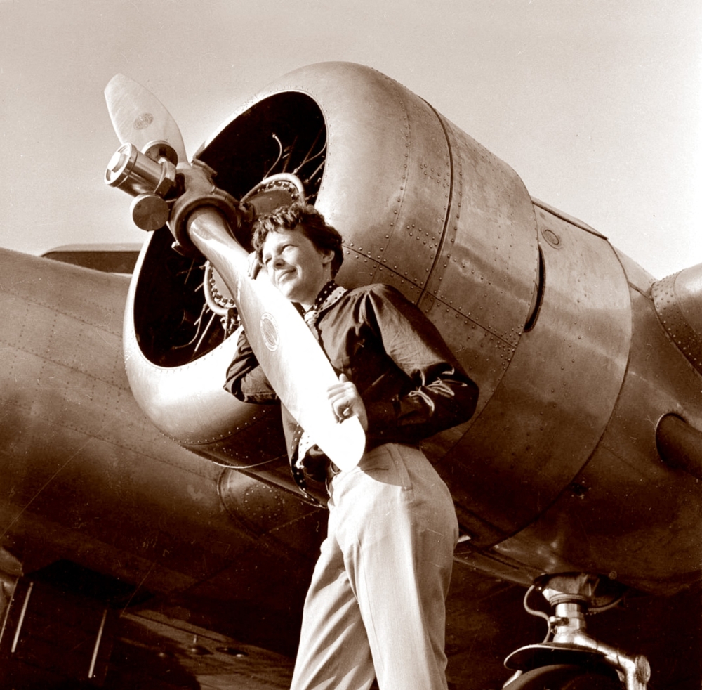 An undated 1930’s file photo shows US aviator Amelia Earhart by the propeller of her Lockheed 10 Electra. — AFP pic