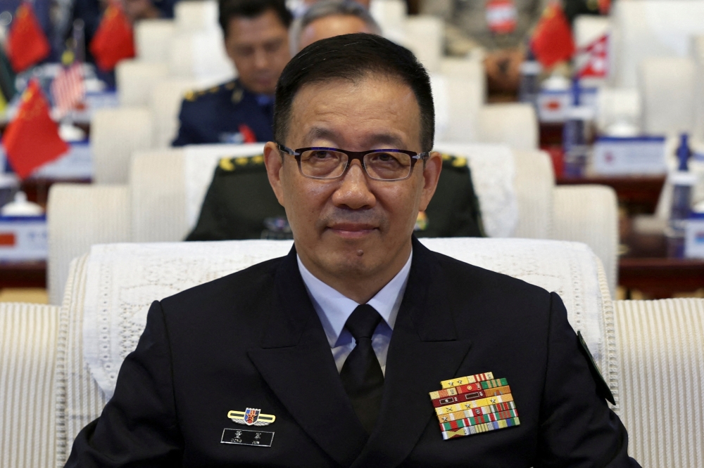 Chinese Defence Minister Dong Jun is the third consecutive serving or former Chinese defence minister to be investigated for alleged corruption, the FT reported, citing current and former US officials. — Reuters pic