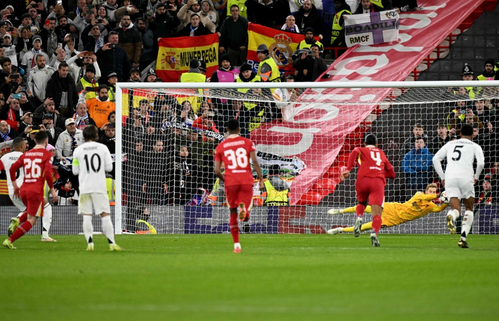 Liverpool’s goalkeeper Caoimhin Kelleher saves a penalty shot from Real Madrid’s Kylian Mbappe during the Uefa Champions League match at Anfield in Liverpool November 27, 2024. — AFP pic