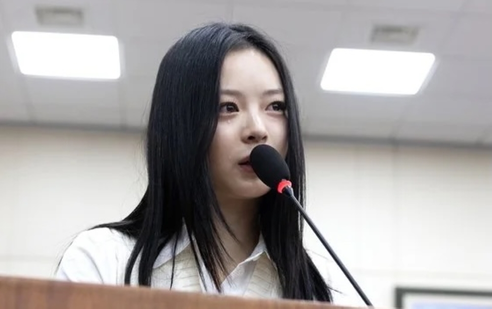 Hanni of NewJeans responds to lawmakers’ questions on workplace bullying at the National Assembly in Seoul October 15, 2024. — Screengrab from Facebook