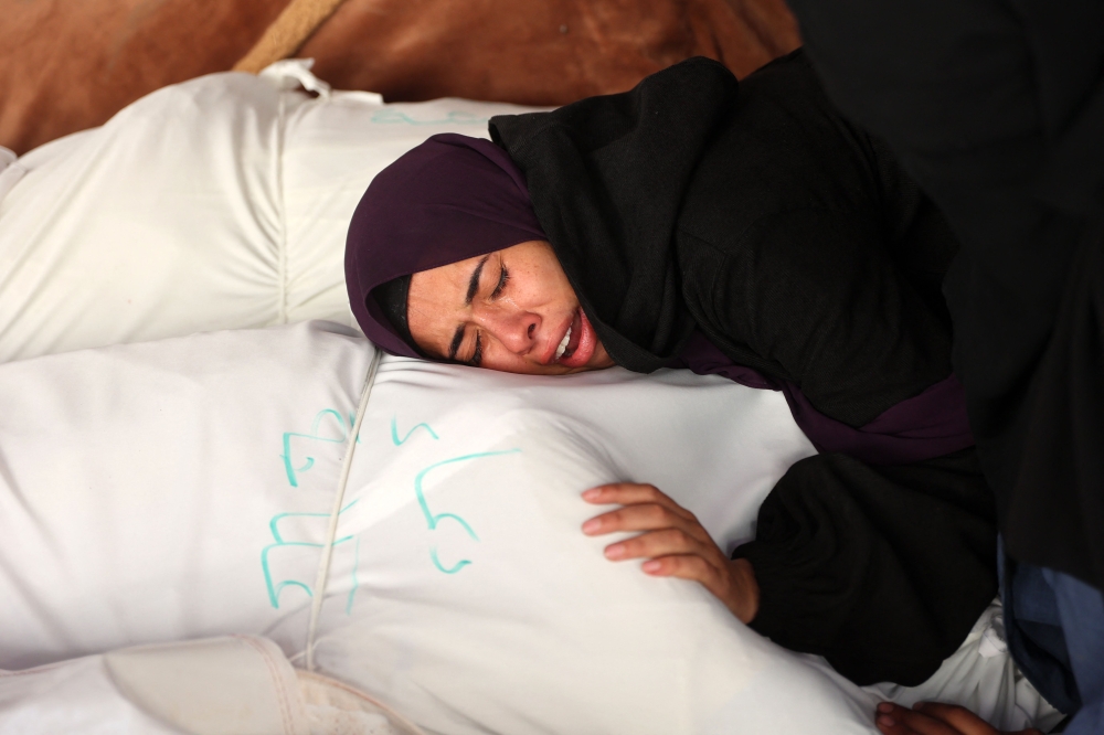 Hamas is open to discussing all ideas and proposals on a possible ceasefire in Gaza, a senior official of the Palestinian group said. — AFP pic