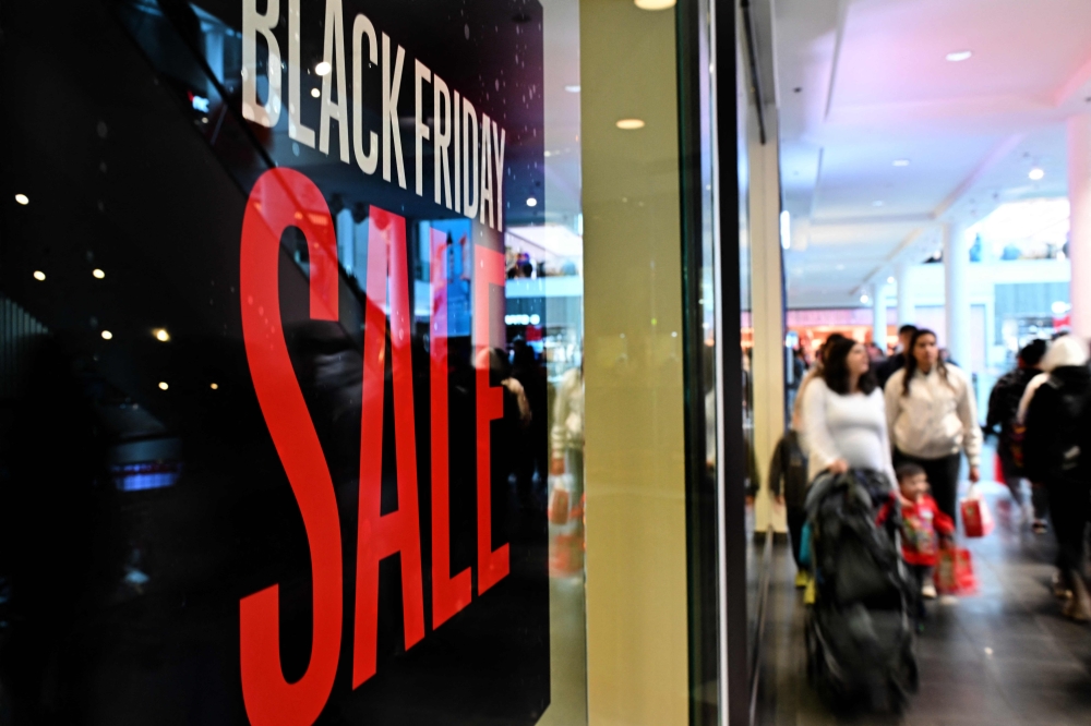 American consumers spent a record US$10.8 billion online during Black Friday promotions, with many using artificial intelligence tools to find the best deals, Adobe Analytics announced yesterday. — AFP pic