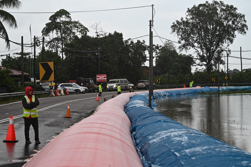 The pilot for the Flood Mitigation Technology (NoFloods) is deployed at Jalan Seberang Jertih in Jerteh, Kelantan, on Nov 30, 2024. — Bernama pic