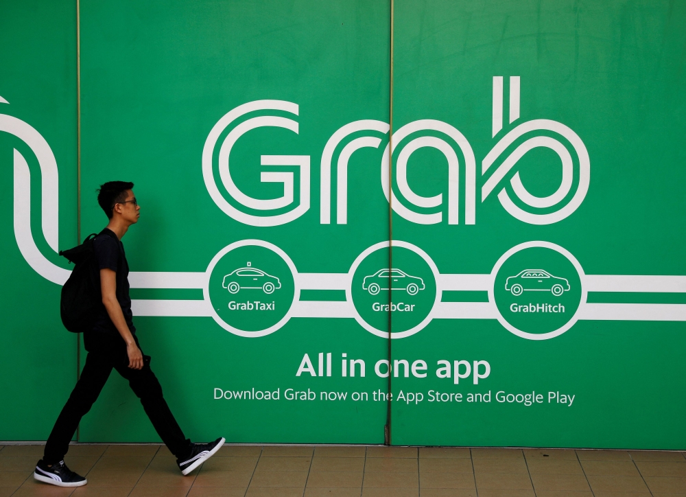 The passenger said they had booked a JustGrab service, which connects passengers to nearby drivers for fixed-fare rides, for two people and a wheelchair. — Reuters pic