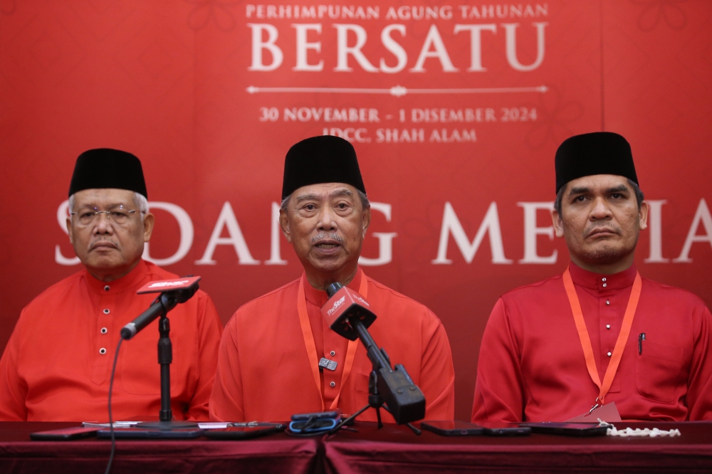 Bersatu president Tan Sri Muhyiddin Yassin (centre) speaks at a press conference after the party's annual general meeting at Ideal Convention Centre in Shah Alam December 1, 2024. — Picture by Yusof Mat Isa