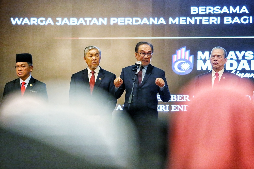 Prime Minister Datuk Seri Anwar Ibrahim delivers a speech during the Prime Minister’s Department monthly gathering at Puspanitapuri, Putrajaya, December 2, 2024. –– Picture by Choo Choy May