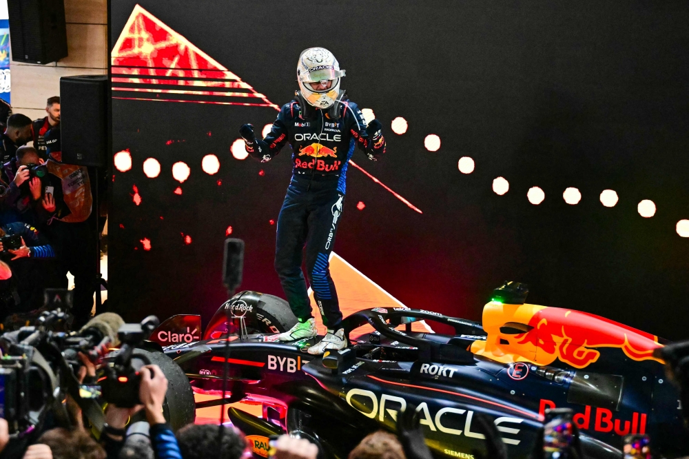Red Bull Racing’s Dutch driver Max Verstappen celebrates after winning the Qatari Formula One Grand Prix December 1, 2024. — AFP pic