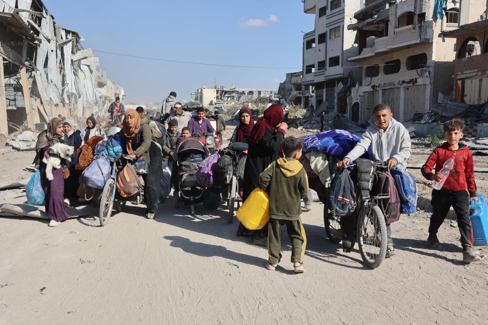 Palestinians, displaced from Beit Lahia, arrive in Jabalia in the northern Gaza Strip on December 4, 2024, amid the ongoing war between Israel and the Palestinian Hamas movement. — AFP pic