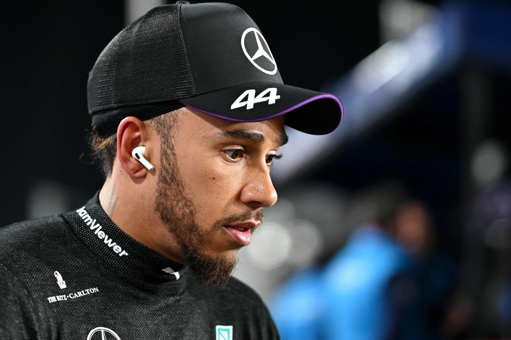 Mercedes’ British driver Lewis Hamilton heads to the grid ahead of the Qatari Formula One Grand Prix at the Lusail International Circuit in Lusail, north of Doha December 1, 2024. Hamilton bids farewell to Mercedes, the team that carried him to six world titles, this weekend as his future outfit Ferrari, seek to snatch a first constructors’ crown in 16 years from McLaren, his first F1 home. — AFP pic