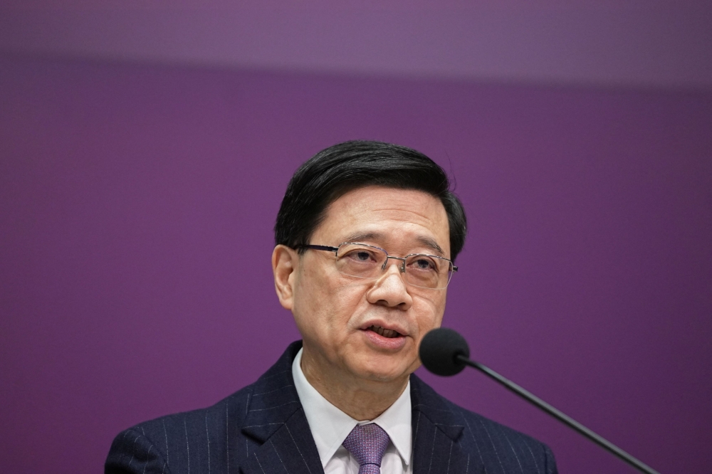Hong Kong Chief Executive John Lee attends a press conference regarding the legislation of Article 23 national security laws, in Hong Kong January 30, 2024. ― Reuters pic