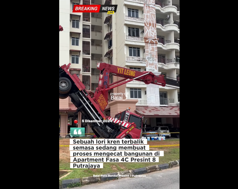 Screenshot from Balai Polis Bandar Presint 7 Putrajaya Facebook video shows a toppled crane at the scene of the fatal incident in Precinct 8, Putrajaya on December 5, 2024.