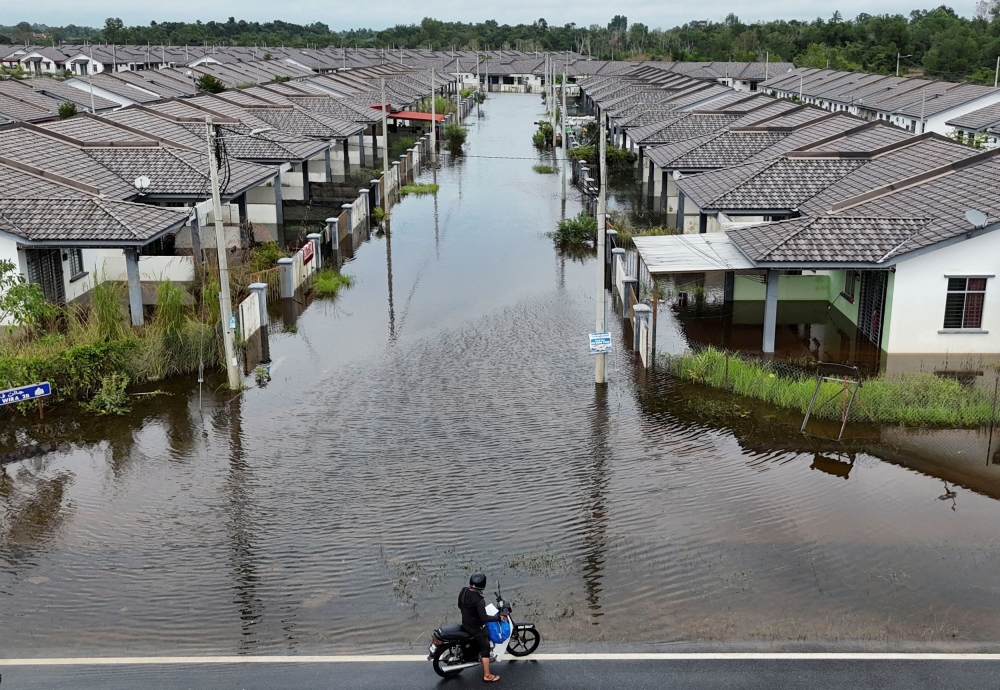 A drone view shows a residential area flooded in Rantau Panjang, Malaysia December 3, 2024. — Reuters pic 