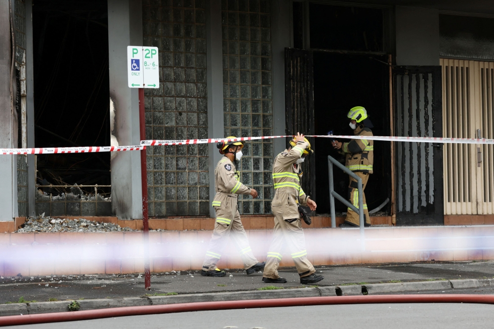 Firefighters work at the scene of a fire at the Adass Israel Synagogue in Ripponlea, Melbourne, Australia, December 6, 2024. — AAP Image/Con Chronis pic via Reuters 