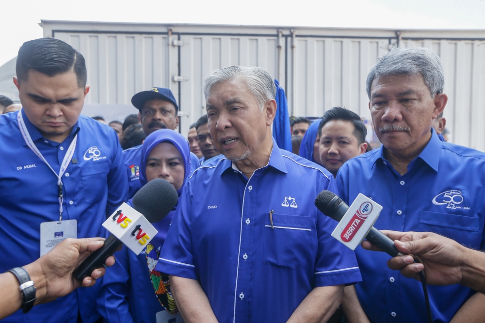 Deputy Prime Minister Datuk Seri Ahmad Zahid Hamidi speaks to the media after launching Barisan Nasional’s flood aid programme in Kuala Lumpur on Dec 07, 2024. — Picture by Raymond Manuel