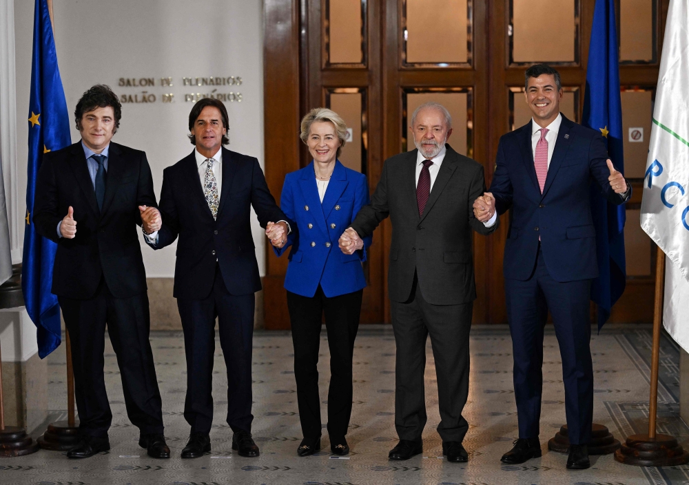 (From left) Argentina’s President Javier Milei, Uruguay’s President Luis Lacalle Pou, European Commission President Ursula von der Leyen, Brazil’s President Luiz Inacio Lula da Silva and Paraguay’s President Santiago Pena pose for the family picture of the LXV Mercosur Summit in Montevideo on December 6, 2024. Mercosur and the European Union have concluded ‘negotiations for a free trade agreement,’ European Commission President Ursula von der Leyen announced in Montevideo yesterday. — AFP pic