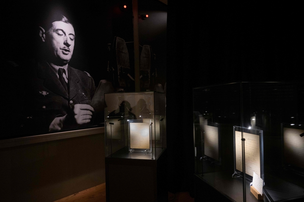 This photograph taken on December 6, 2024, shows a pages from original manuscript of General de Gaulle’s 1940 ‘Appeal of June 18’, displayed ahead of an auction of General de Gaulle’s personal memorabilia and writings (the manuscript displayed in the photograph is not up for sale, however), at Artcurial auction house in Paris. — AFP pic