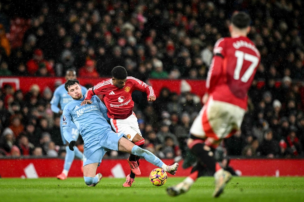 Manchester United suffered a  3-2 loss to high-flying Nottingham Forest, who capitalised on United’s defensive blunders. — AFP pic