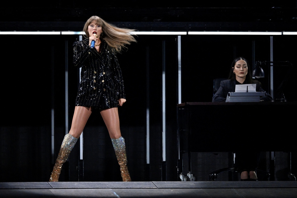 Taylor Swift’s record-shattering Eras Tour is set to end on Sunday in Vancouver with the final performance of a cultural phenomenon that has easily become the highest-grossing musical tour in history. — Reuters pic