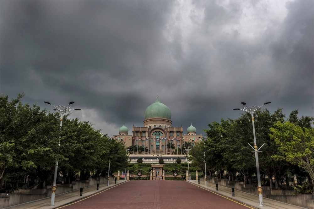 Several areas in 11 states, including Putrajaya, are expected to experience thunderstorms, heavy rain and strong winds this evening. — Picture by Shafwan Zaidom