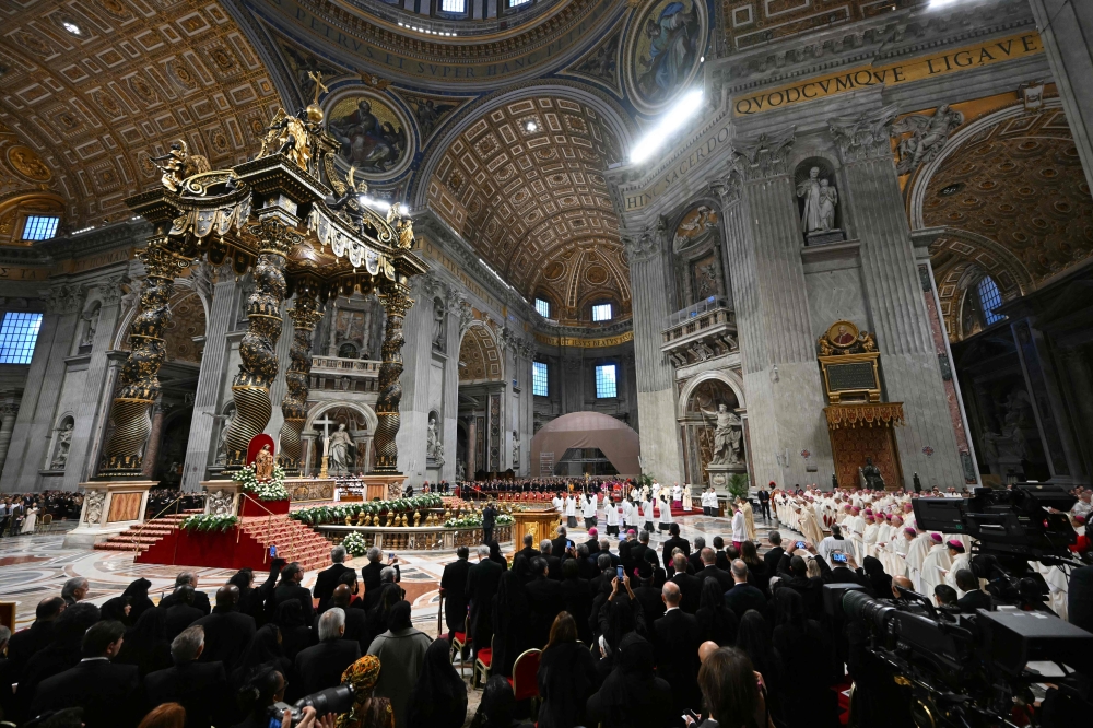 A general view shows St Peter’s Basilica before the start of Mass with the new cardinals in The Vatican, on December 8, 2024. — AFP pic