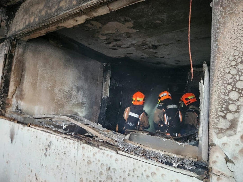 The fire occurred in a unit on the 13th floor of Block 889A Tampines Street 81. — Picture from Facebook/Singapore Civil Defence Force