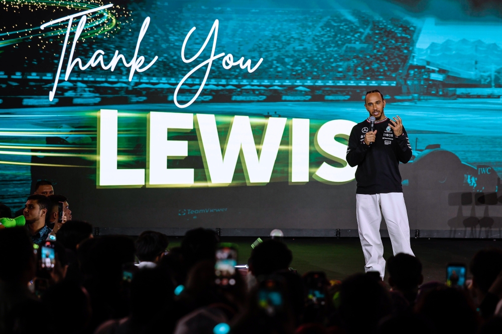 British Formula One (F1) driver Lewis Hamilton greets fans at his farewell event for the F1 Mercedes AMG Petronas Team, held at the Kuala Lumpur Convention Centre (KLCC) yesterday. — Bernama pic