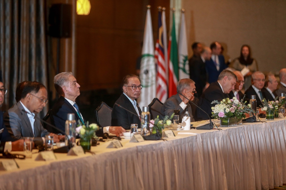 Prime Minister Datuk Seri Anwar Ibrahim speaks (third from left) at Russia-Islamic World Meeting held at the Mandarin Oriental Hotel in Kuala Lumpur on December 11, 2024. — Picture by Sayuti Zainudin 