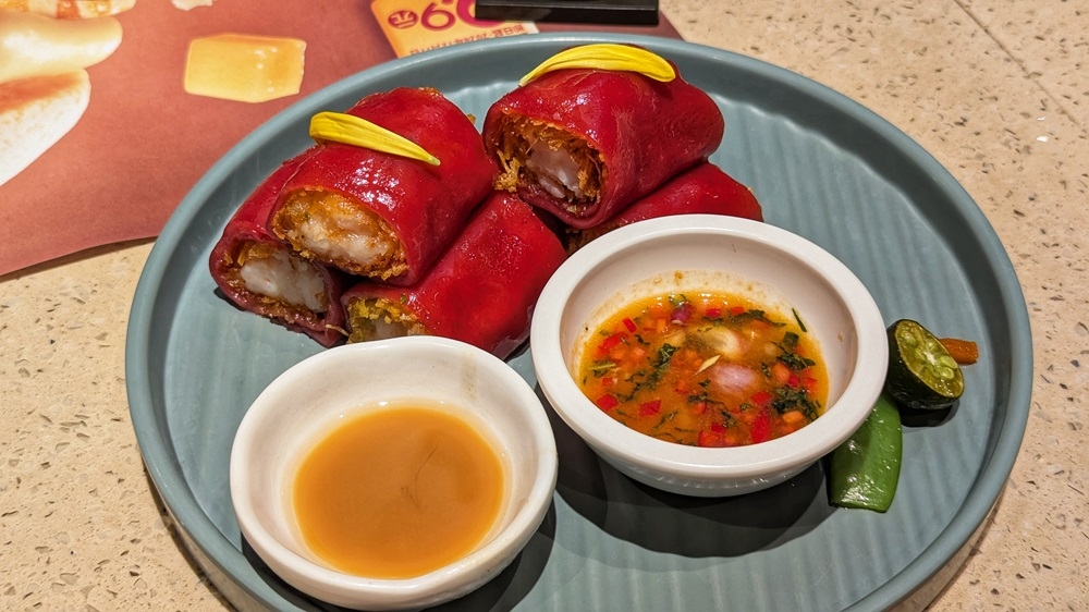 The signature red rice rolls at are a must-order at Dian Dou De. — Picture by by Ethan Lau