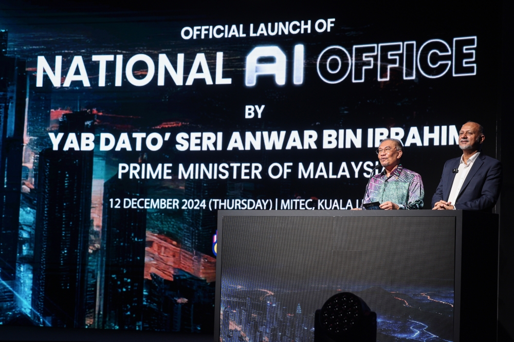 Prime Minister Datuk Seri Anwar Ibrahim (left) and Digital Minister Gobind Singh Deo officiate the launch of the National Artificial Intelligence Office (NAIO) at the Malaysia International Trade and Exhibition Centre (MITEC) today. — Bernama pic