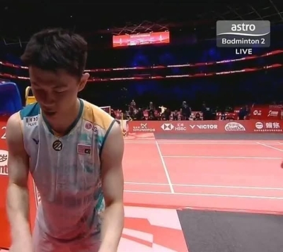 Sponsor of national shuttler Lee Zii Jia’s kit says sorry for ‘unintended’ upside-down Malaysian flag on jersey at world final