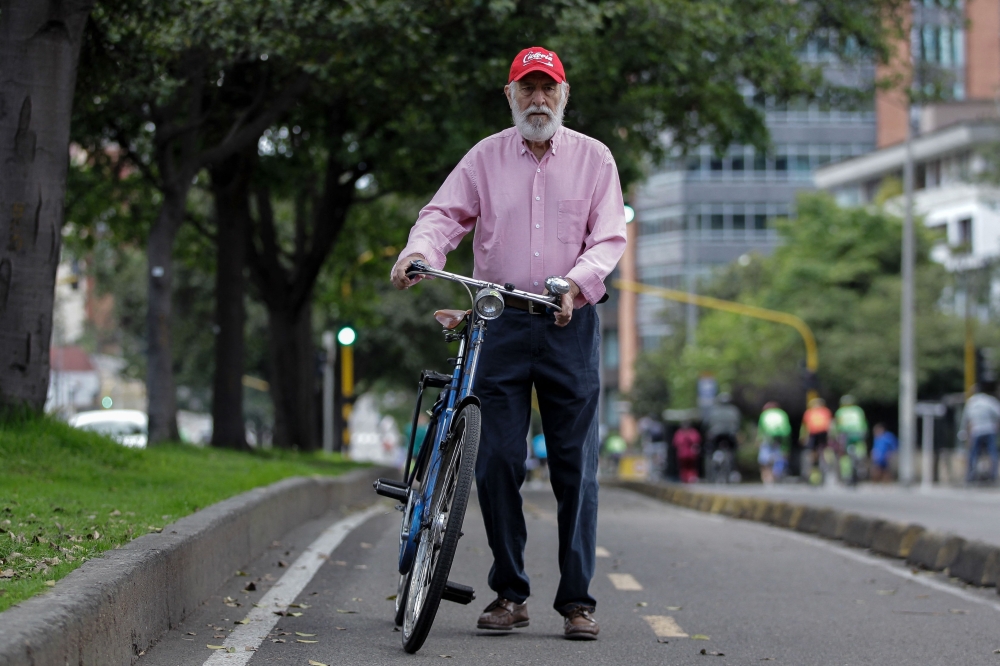 Jaime Ortiz Marino, founder of Ciclovia, poses for a picture during an interview with AFP during a weekly car-free day in Bogota on December 8, 2024. — AFP pic 